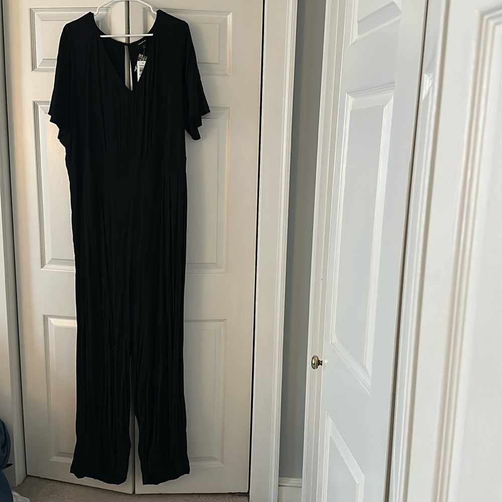 Black V neck short sleeve jumpsuit from torrid